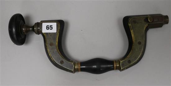 A James Howarth brass framed ebony brace with their Corporate Mark with ebony head height 36cm